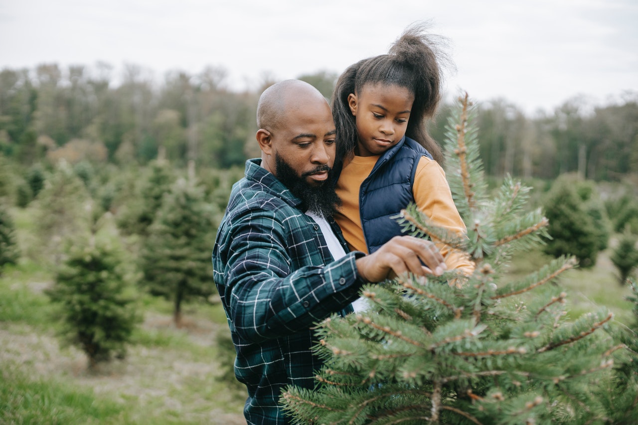 man holding his daughter