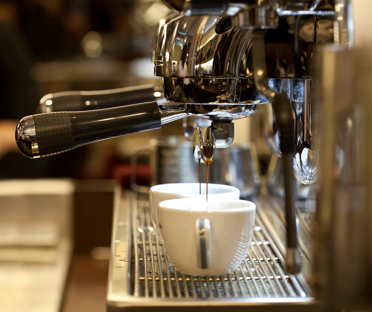 coffee being poured out of the coffee maker