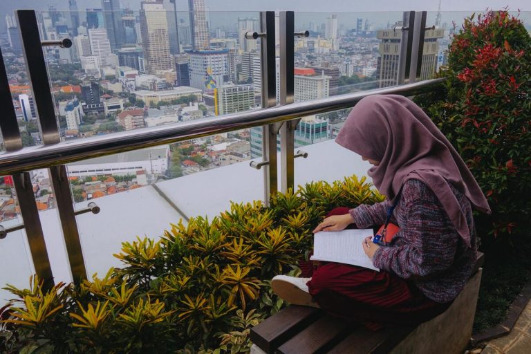 woman wearing hijab while working