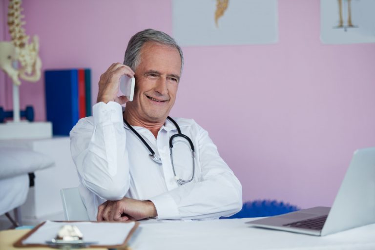 doctor speaking on the phone