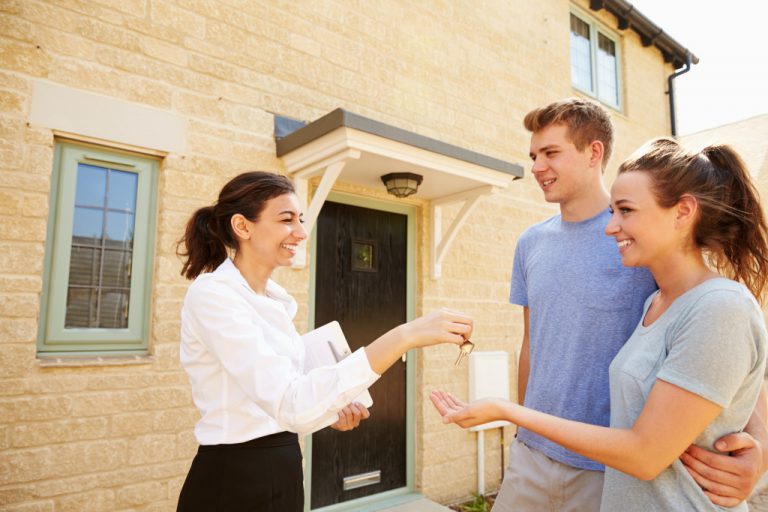 young couple buying house