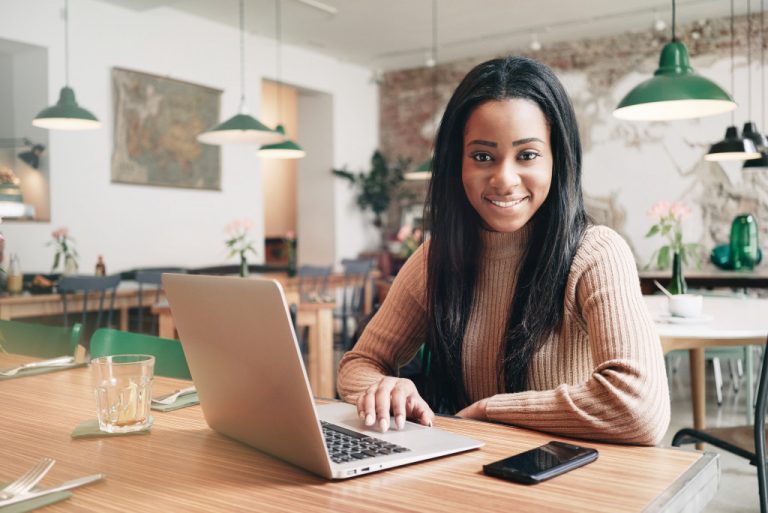 a woman working on their computer