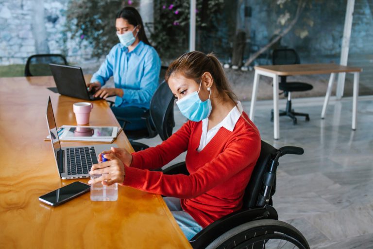people wearing masks at the office