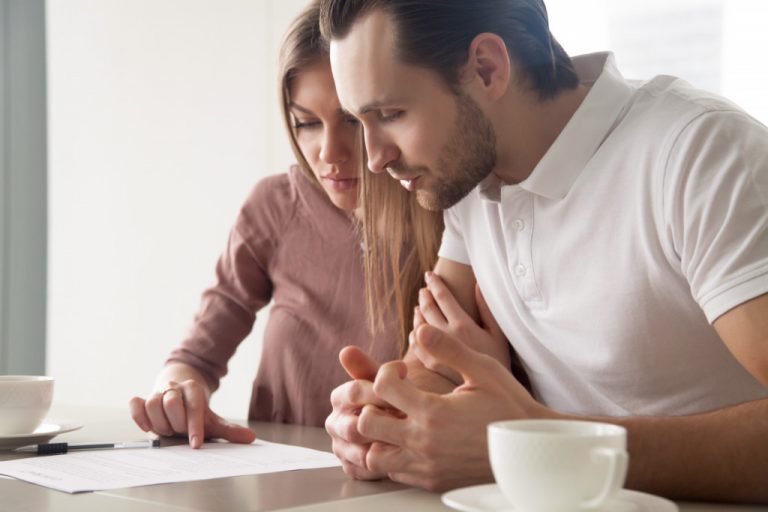 couple buying a house