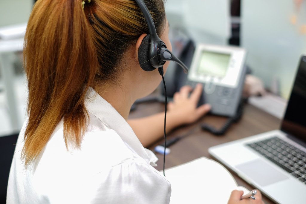 a woman handling phone calls