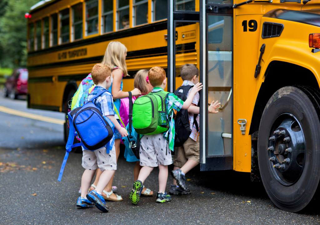 Children riding a school bus