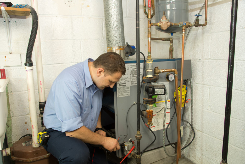 Homeowner performing maintenance task