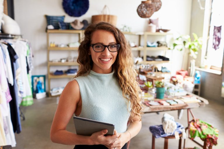 A clothing business owner insider her store