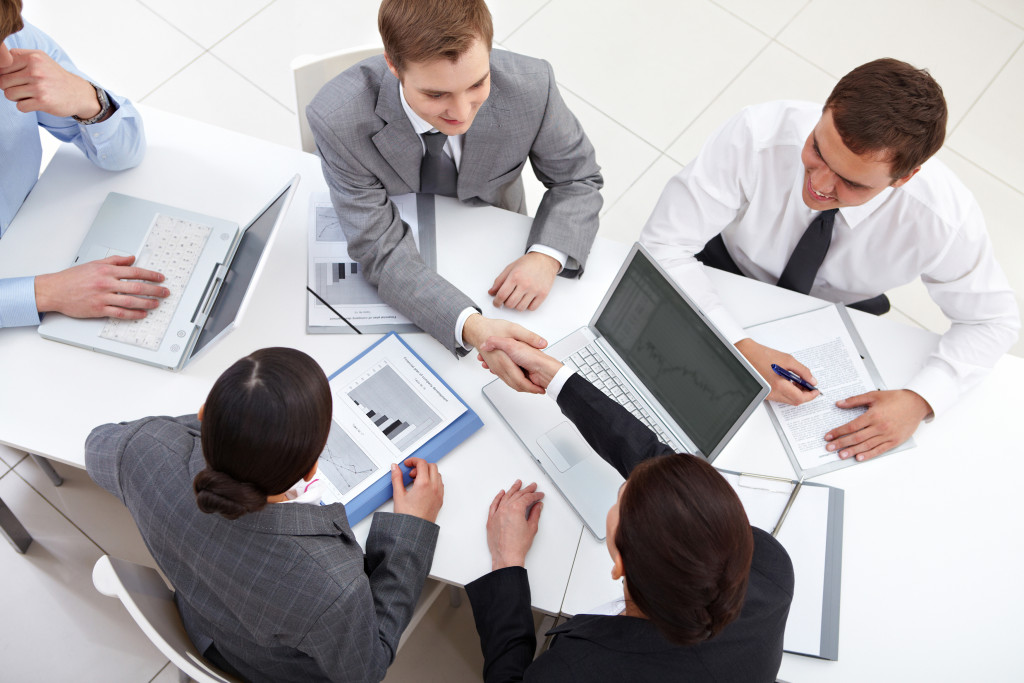 employees having a discussion at the table