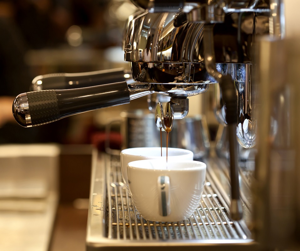 a mug in a coffee maker