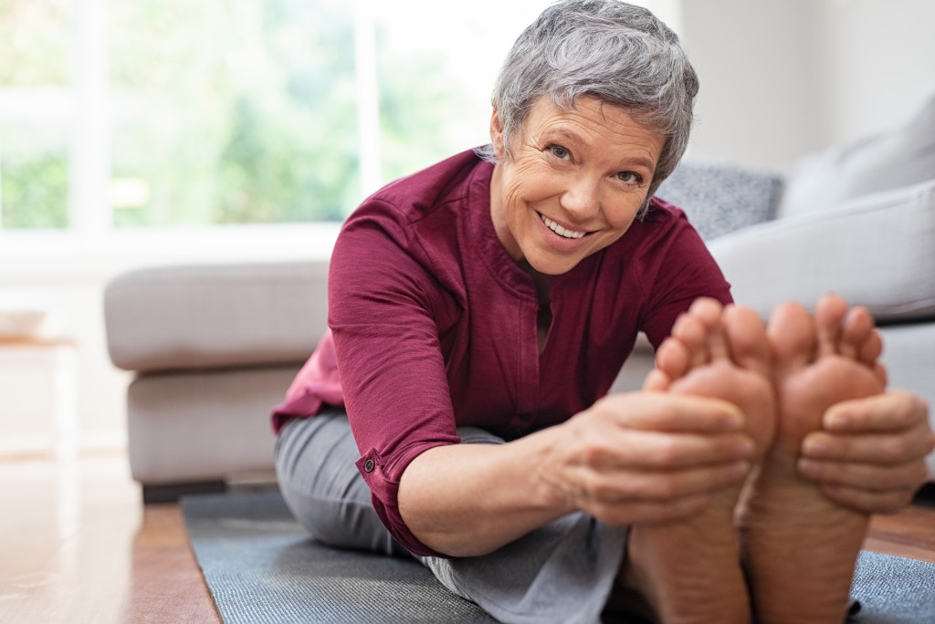 a senior at home exercising